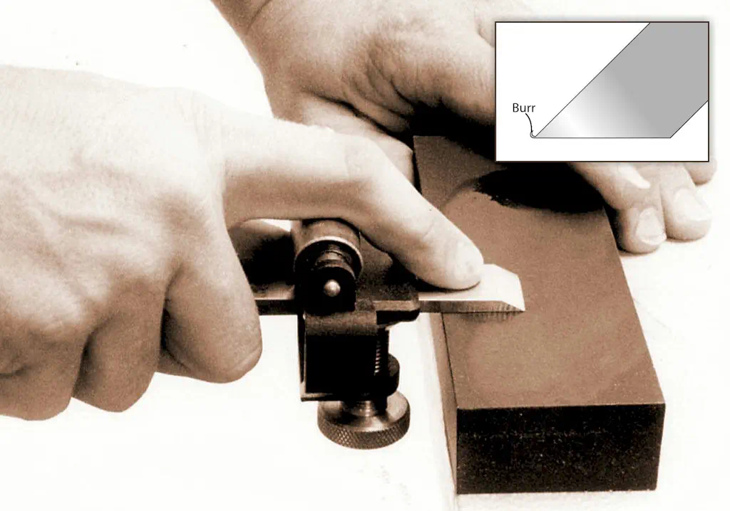 removing burr from back of chisel with sharpening stone